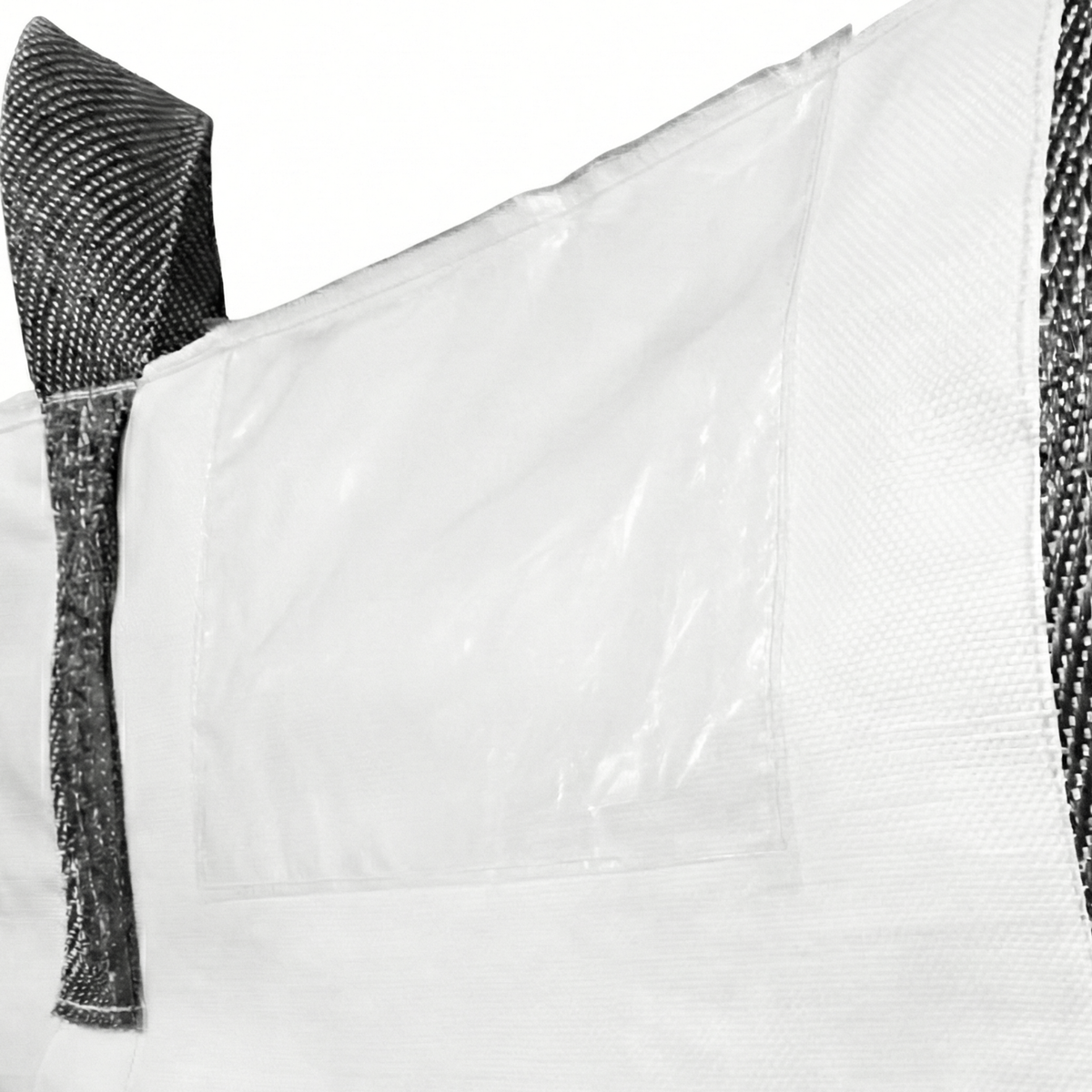 High-resolution detail of the resistant polypropylene weave used in the manufacture of super sacks and big bags.