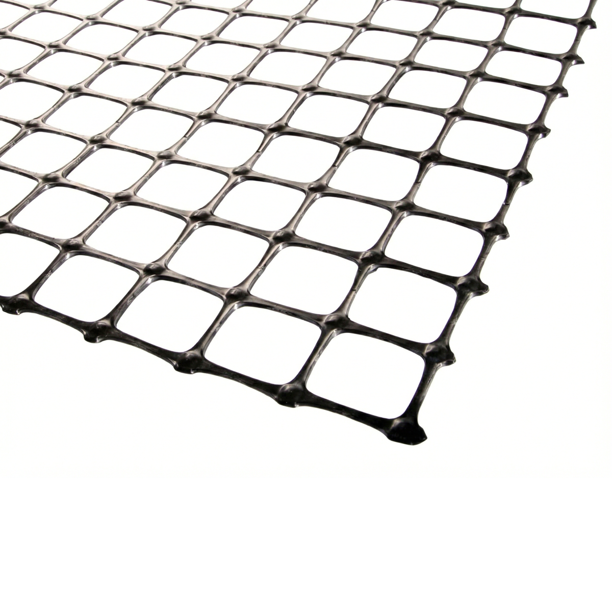 Gros plan de la trame d'une géogrille biaxiale, matériau à haute résistance à la traction pour les murs de soutènement en République dominicaine.