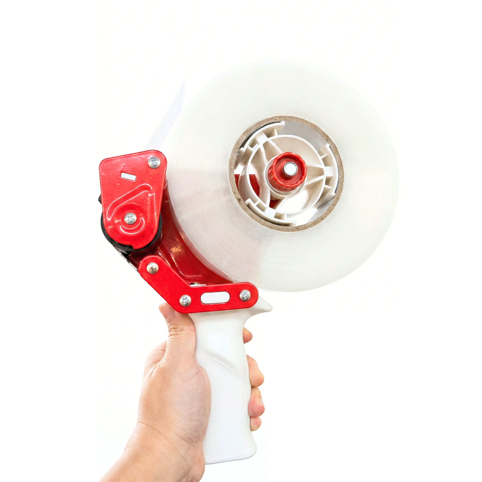 Dispensador manual de cinta o pistola de teipe en uso, herramienta ergonómica para el sellado rápido de cajas de cartón.