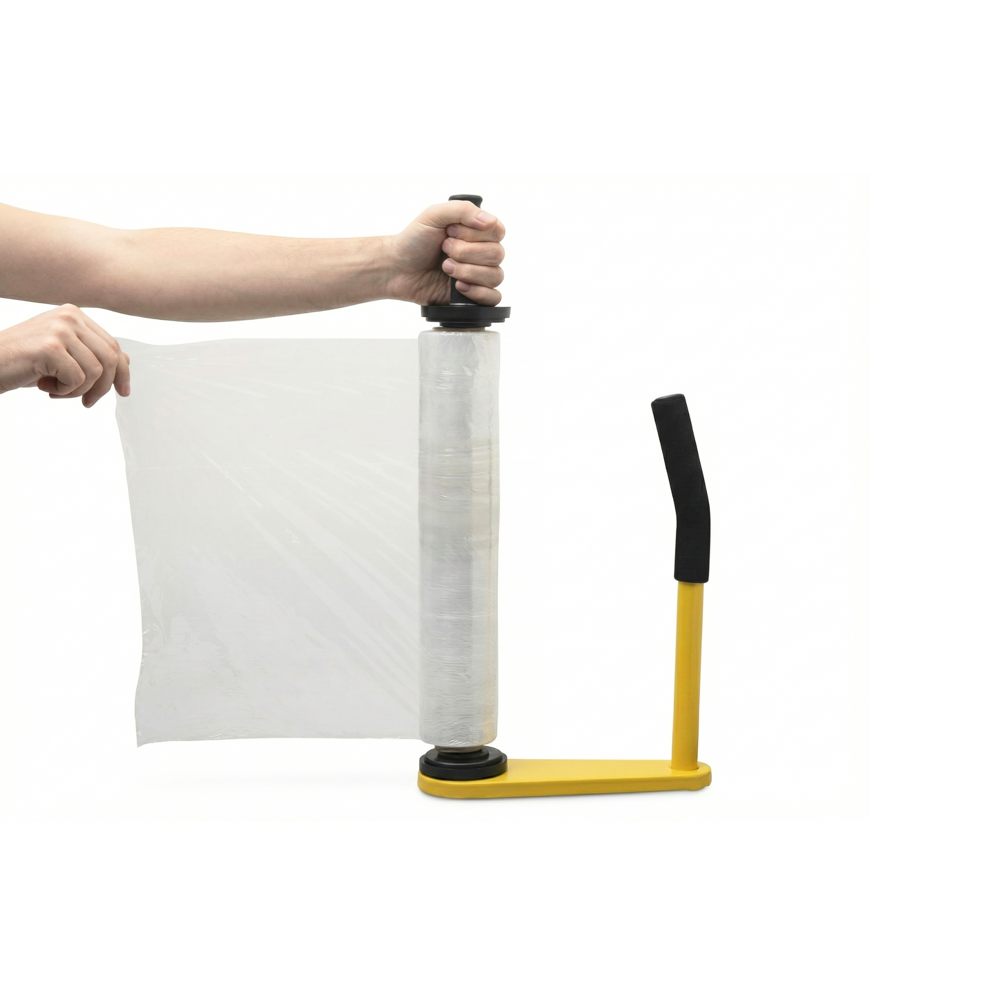 Operator using a yellow manual dispenser to apply stretch film ergonomically on packages in the Dominican Republic.