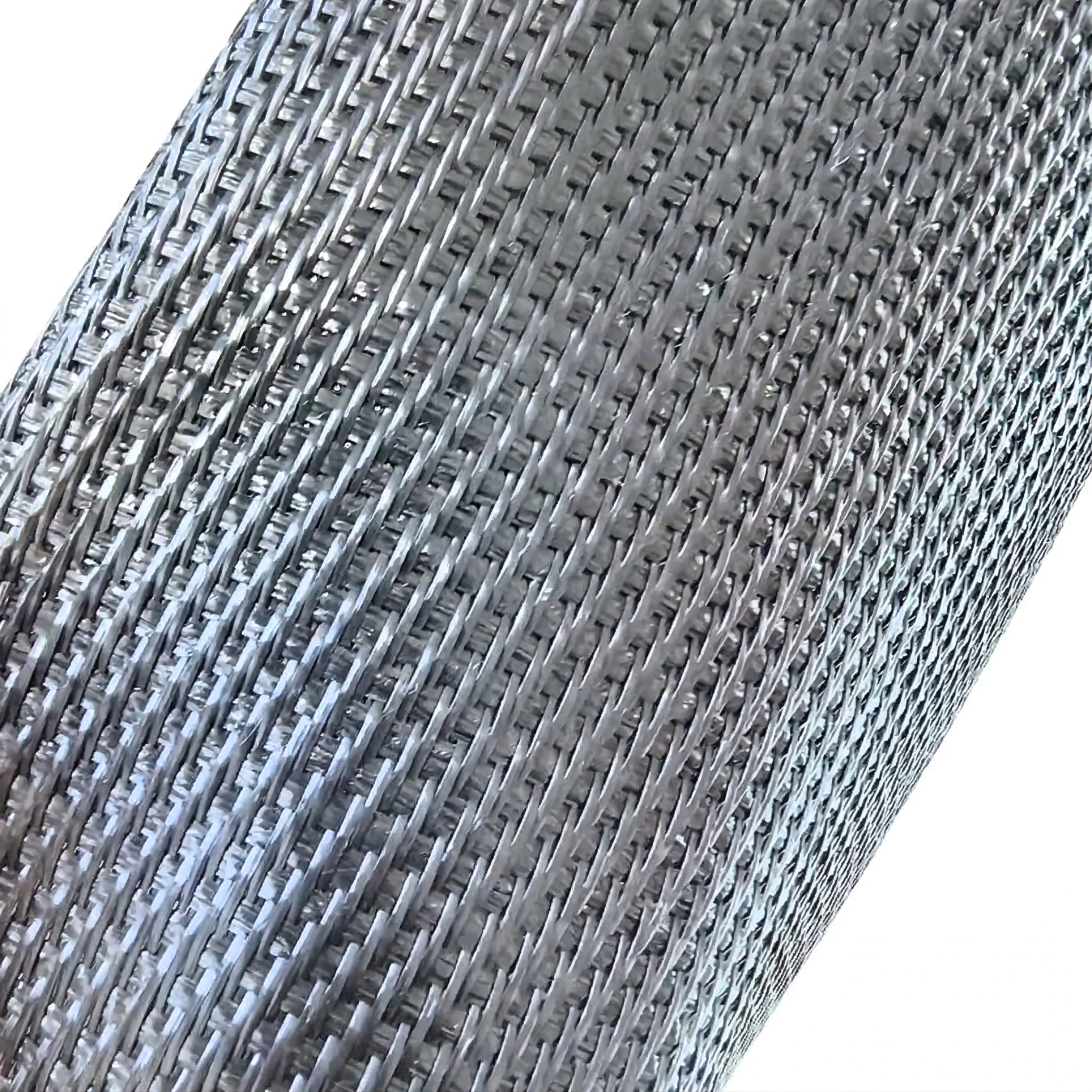 Detail of the woven weave of the PP geotextile, ensuring mechanical strength for soil stabilization.