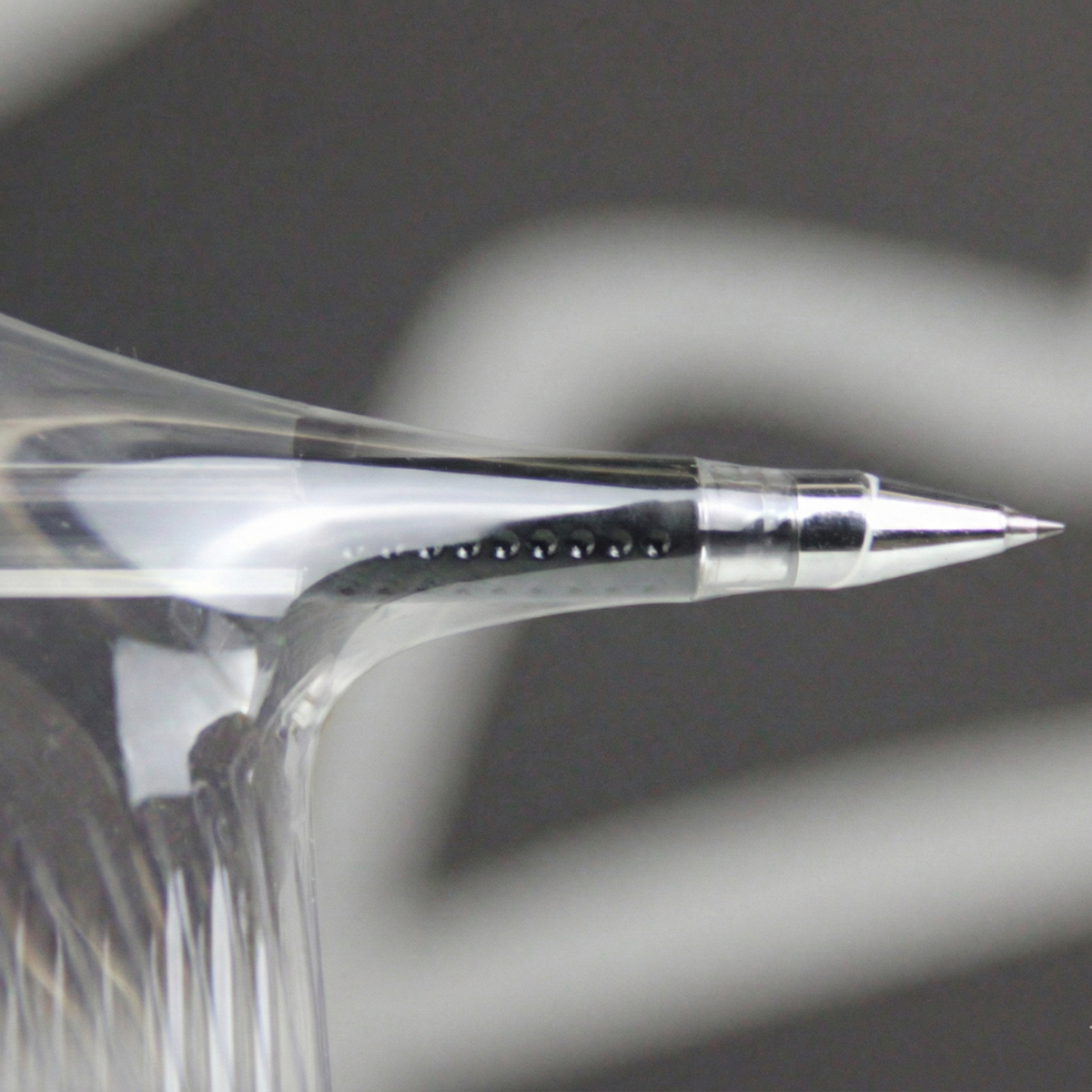 Stretch film undergoing a puncture test to demonstrate its quality.