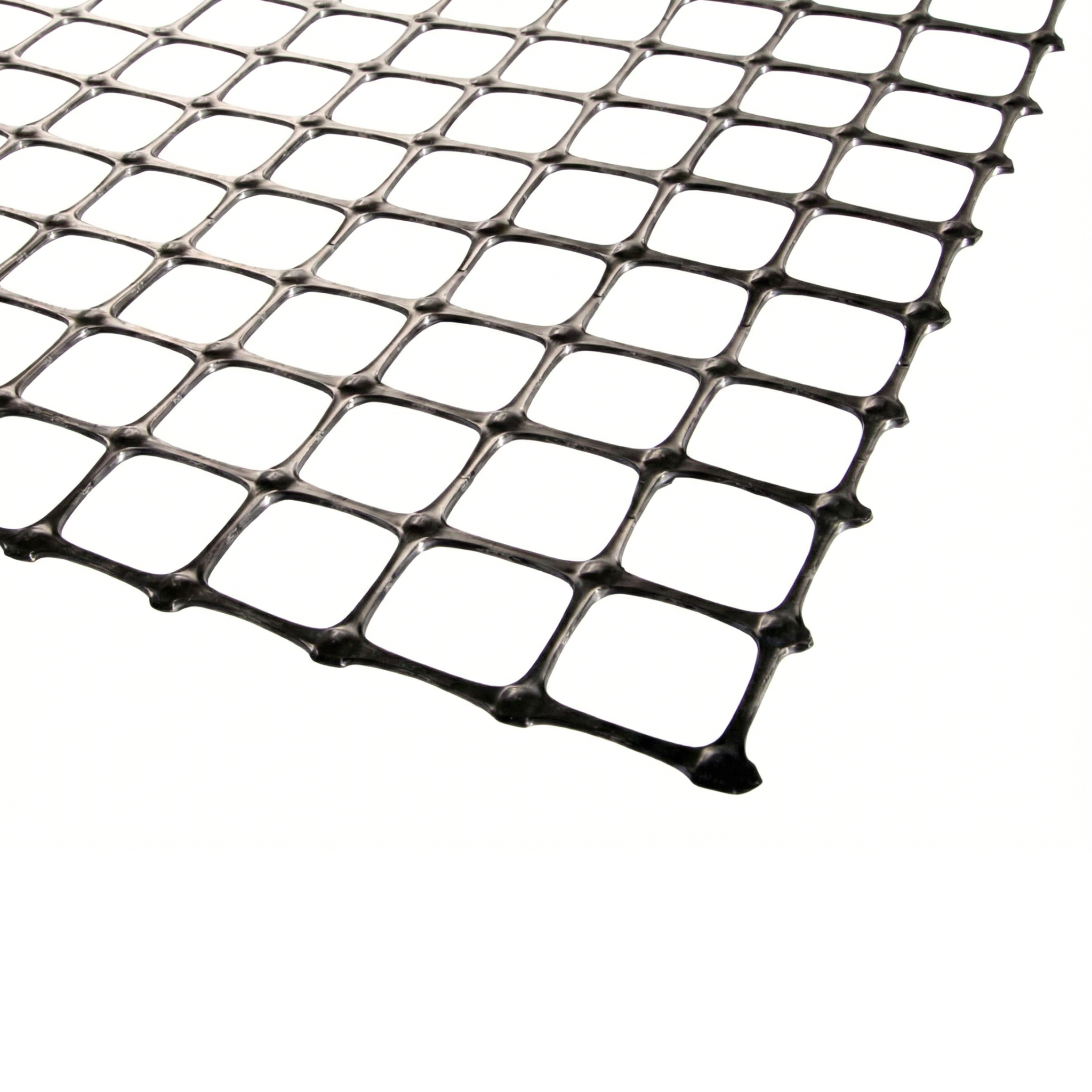 Primer plano de la trama de una geomalla biaxial (geogrid), material de alta resistencia a la tracción para muros de contención en RD.
