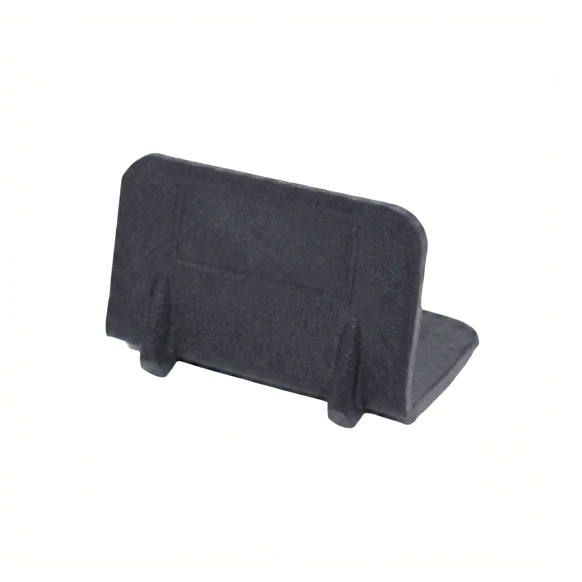 Black plastic corner protector to shield the edges of cardboard boxes from strapping tension in the Dominican Republic.