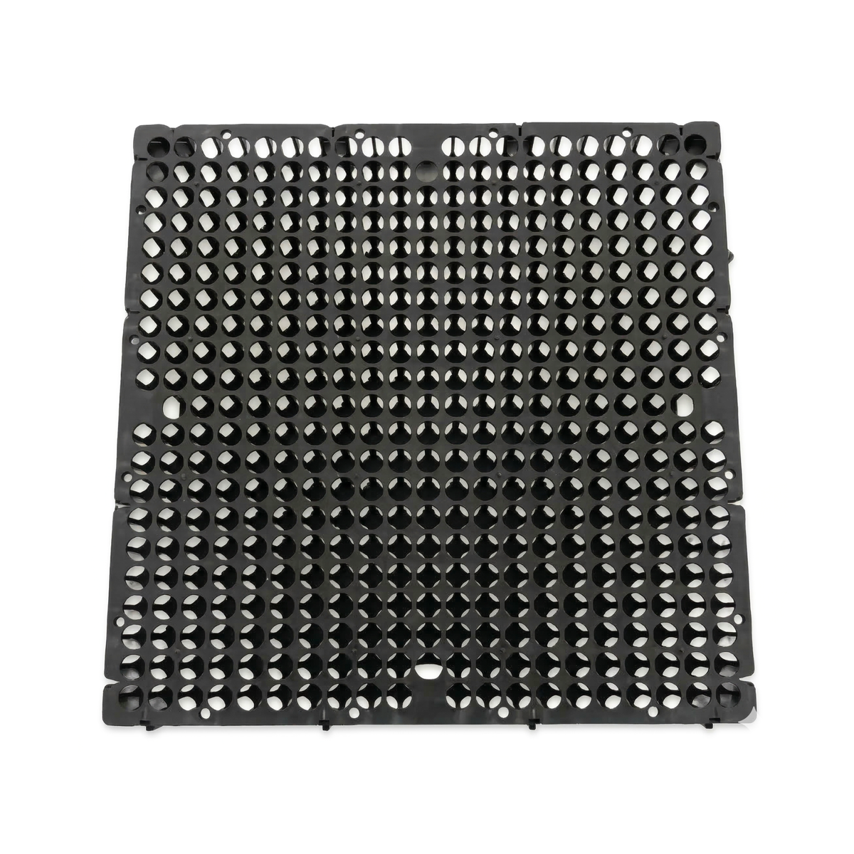 Système de dalles de drainage plastique modulaires empilées, prêtes à l'installation sur toitures végétalisées et murs.
