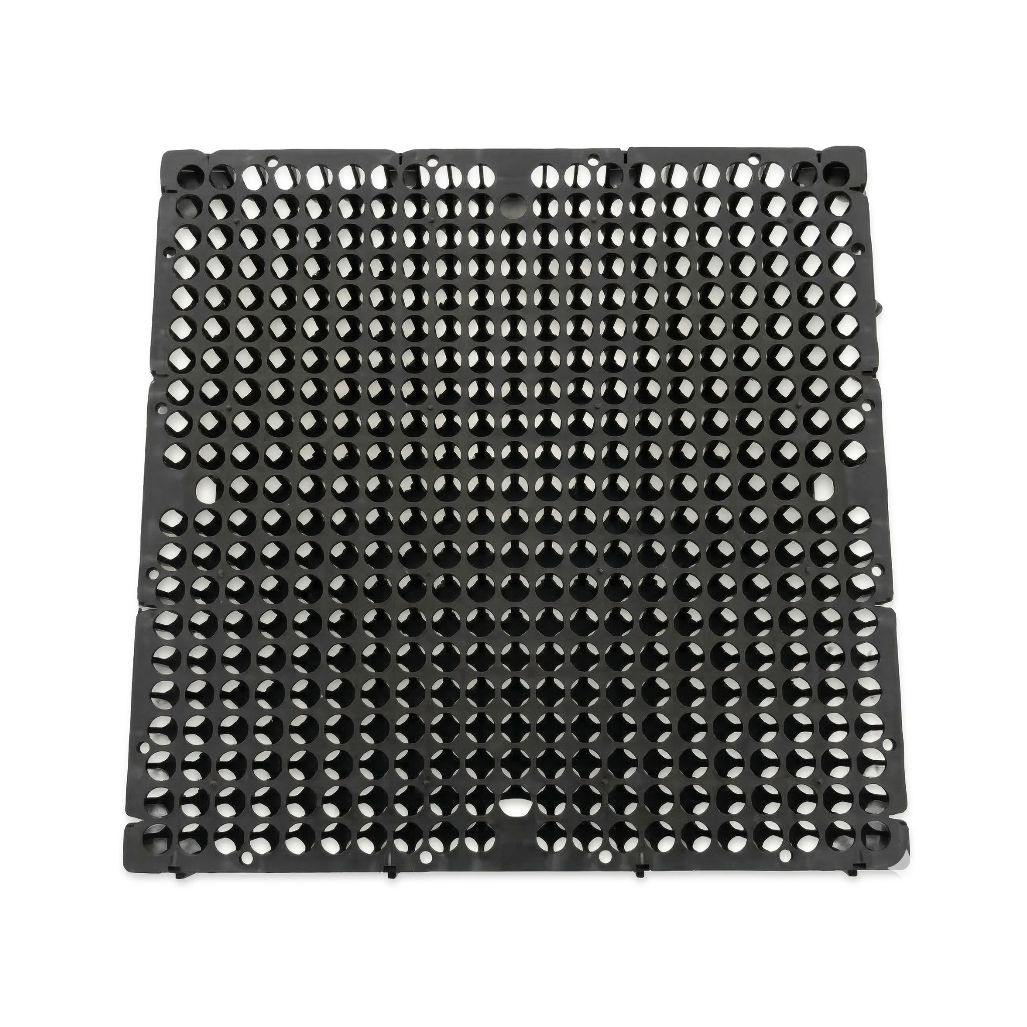 Système de dalles de drainage plastique modulaires empilées, prêtes à l'installation sur toitures végétalisées et murs.
