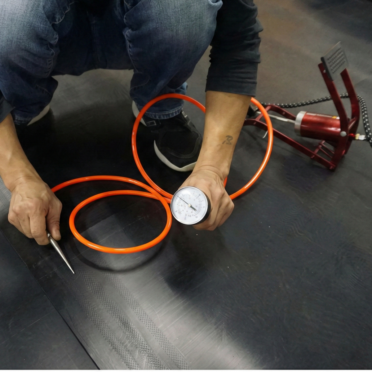 Air pressure gauge in use to verify the weld quality of liner and geomembranes in projects in the Dominican Republic.